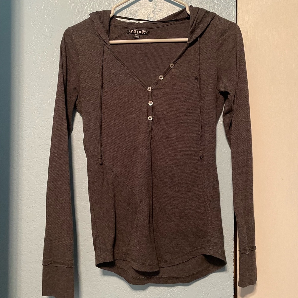 volcom long sleeve with hood and buttons.